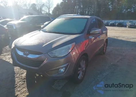 2011 Hyundai Tucson Limited из США, поврежденный, VIN KM8JU3ACXBU236441